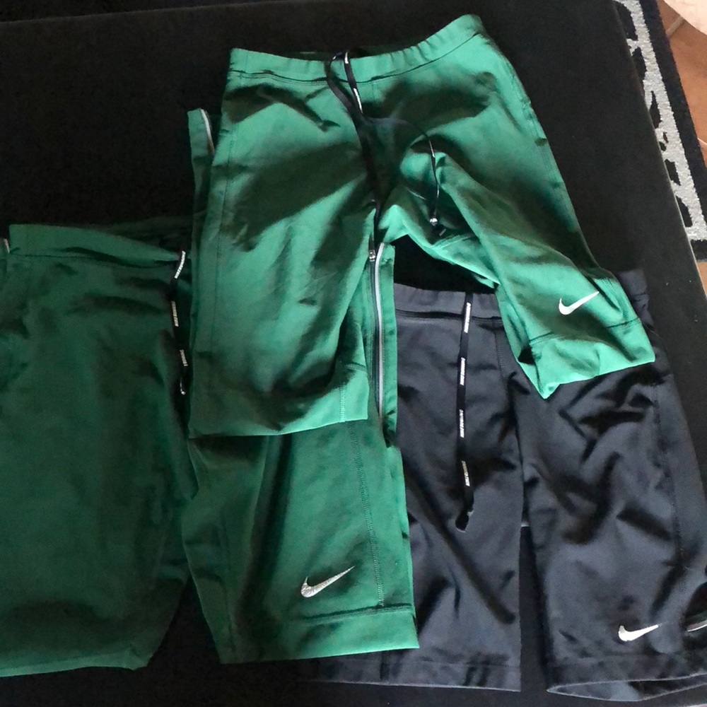 2 green pants, 1 black shorts